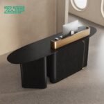 Office counter with oval black wood and gold trim